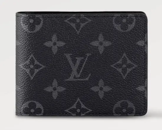 A guest wears an oversized gray Louis Vuitton Monogram Boyhood