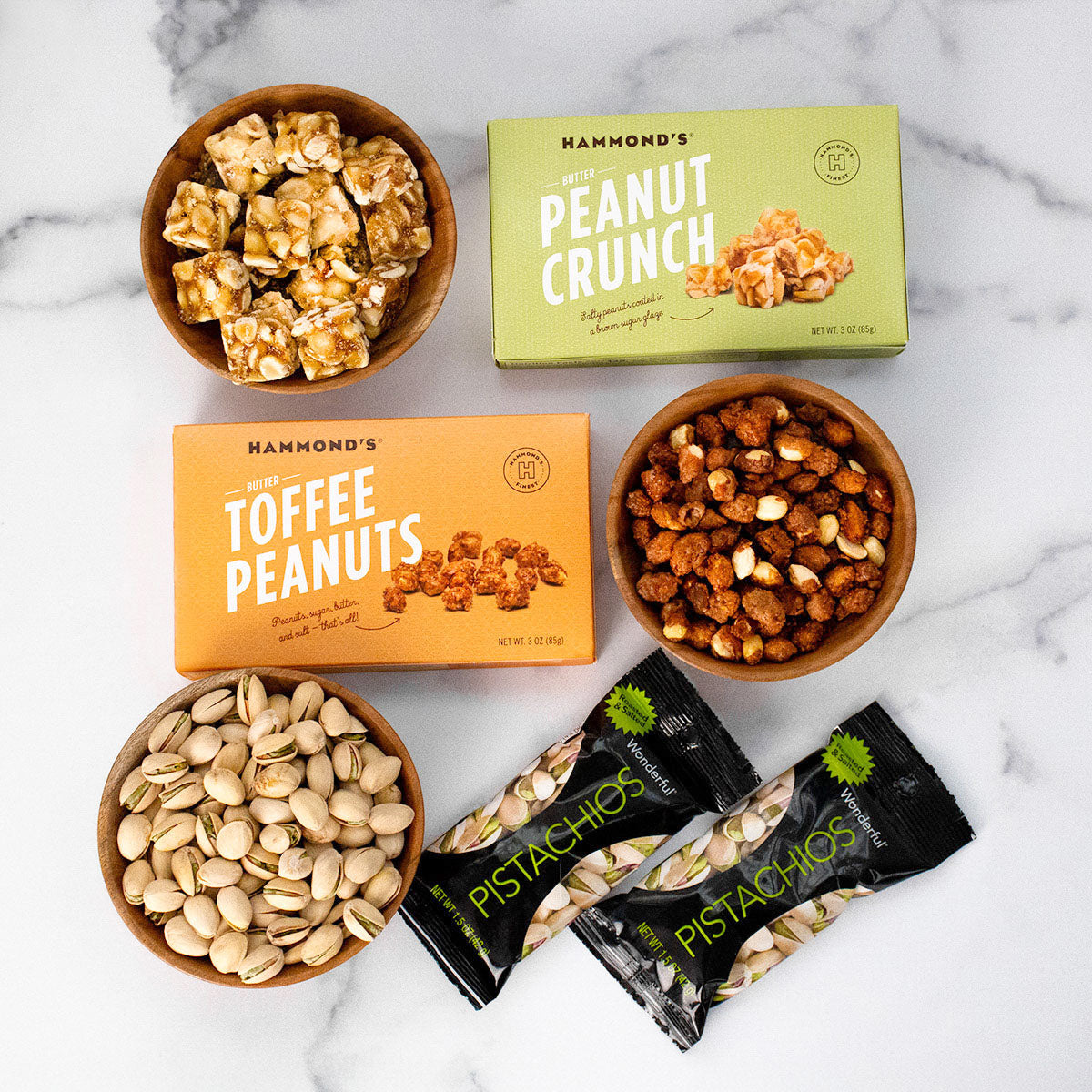 An assortment of gourmet nutty snacks in bowls