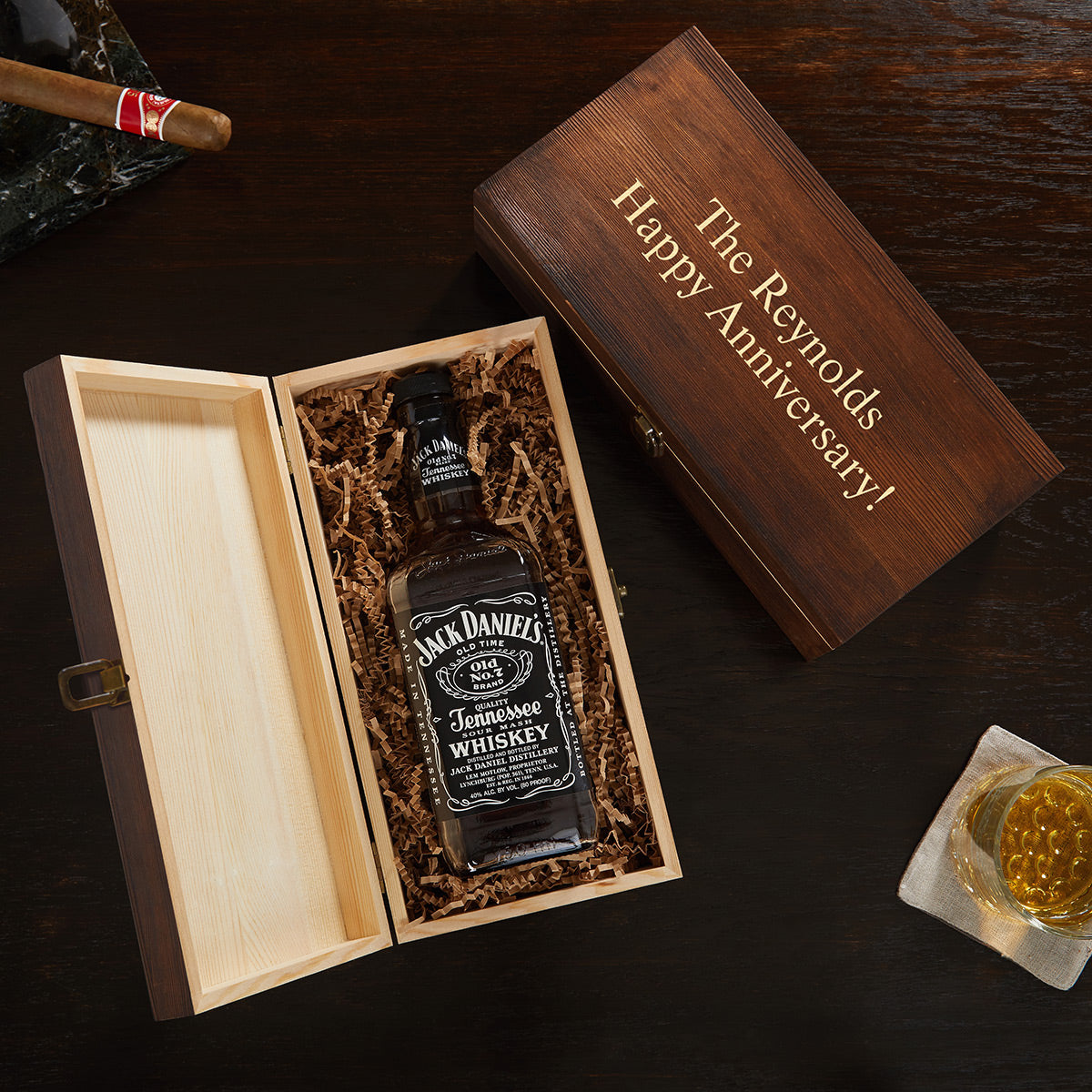 custom rectangular wooden box with empty liquor bottle inside