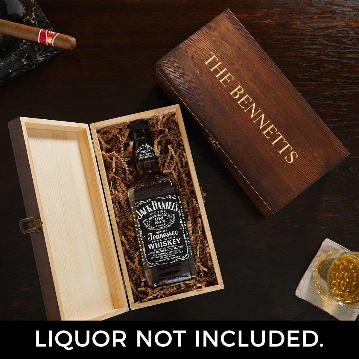 custom rectangular wooden box with empty liquor bottle inside